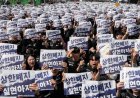 Samsung workers rally in South Korea, demanding higher pay and threatening to strike