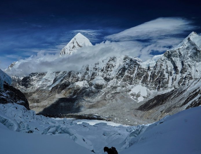A massive, unstable ice block stalls Everest climbers at base camp
