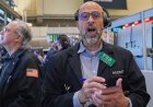 Wall Street mixed early and oil prices steady as Trump arrives in China to meet with Xi