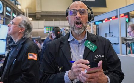 Wall Street mixed early and oil prices steady as Trump arrives in China to meet with Xi