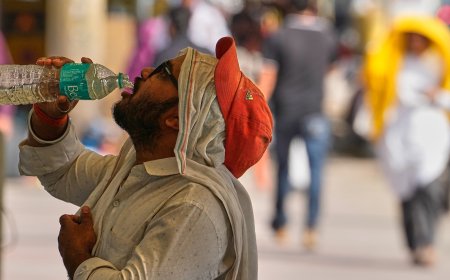 Heat wave empties roads and markets in north India as some farmers turn to nighttime work