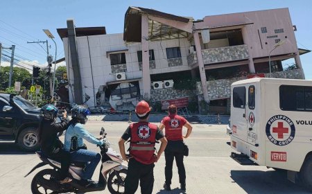 A 7.8 magnitude quake in the Philippines kills at least 19, fells buildings and sets off a tsunami