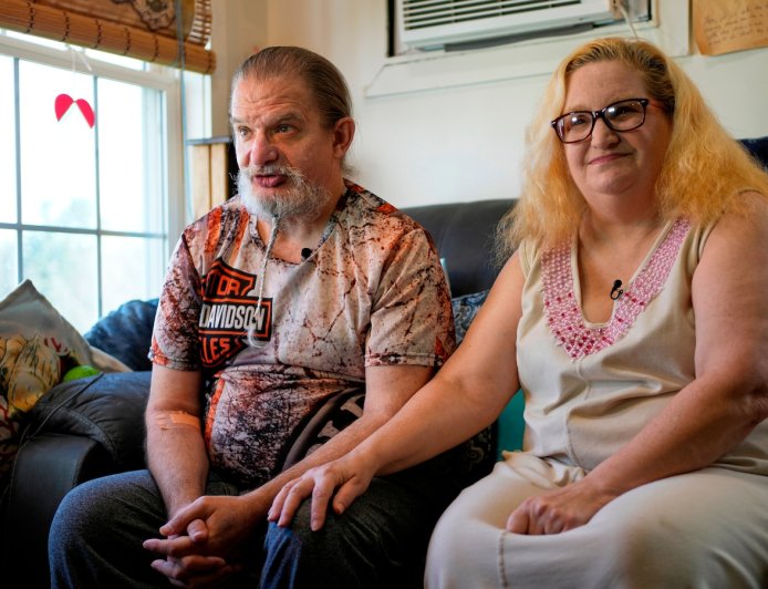 A robot is helping an ailing couple stay in their home. Are more to come for an aging population?