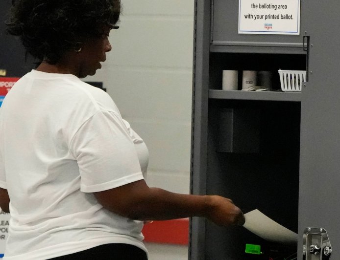 Georgia’s QR codes for counting votes will remain for midterms after lawmakers vote to delay a fix