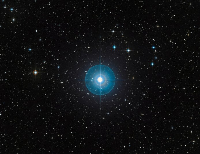 Faint new planet is revealed around a young star after a decade in hiding