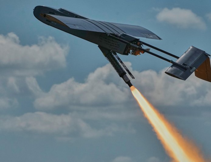 A warehouse burns near Moscow. In Ukraine, drone crews prepare to strike again