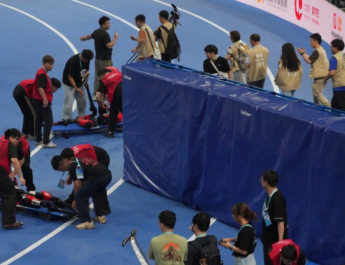A Chinese humanoid robot sets a new 100-meter sprint record at Beijing Games